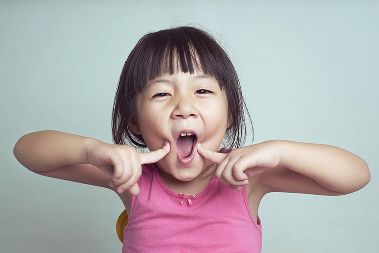 Image of young girl. Clicking on this image will take the user to a page about sedation dentistry for children