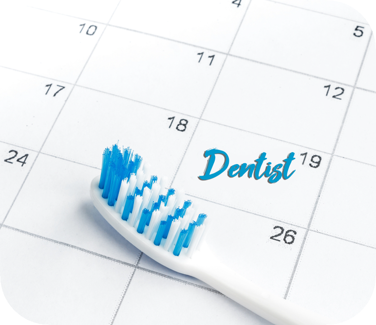 An image of a calendar with a toothbrush on it and the word dentist written on the calendar
